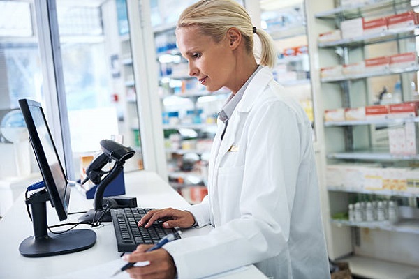 Cropped shot of a female pharmacist working in a chemist